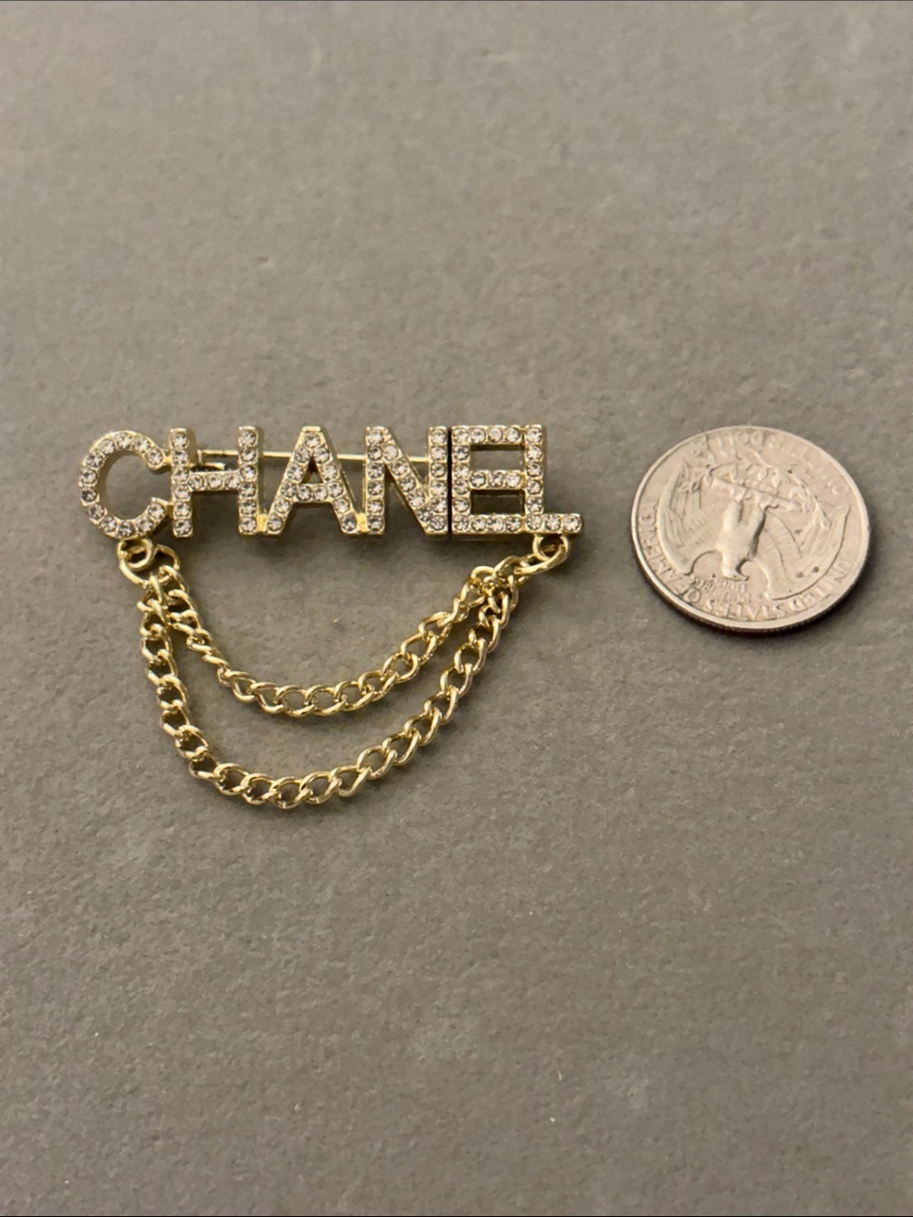 Gold-Tone Crystal Logo Chain Brooch - Picture 3 of 3